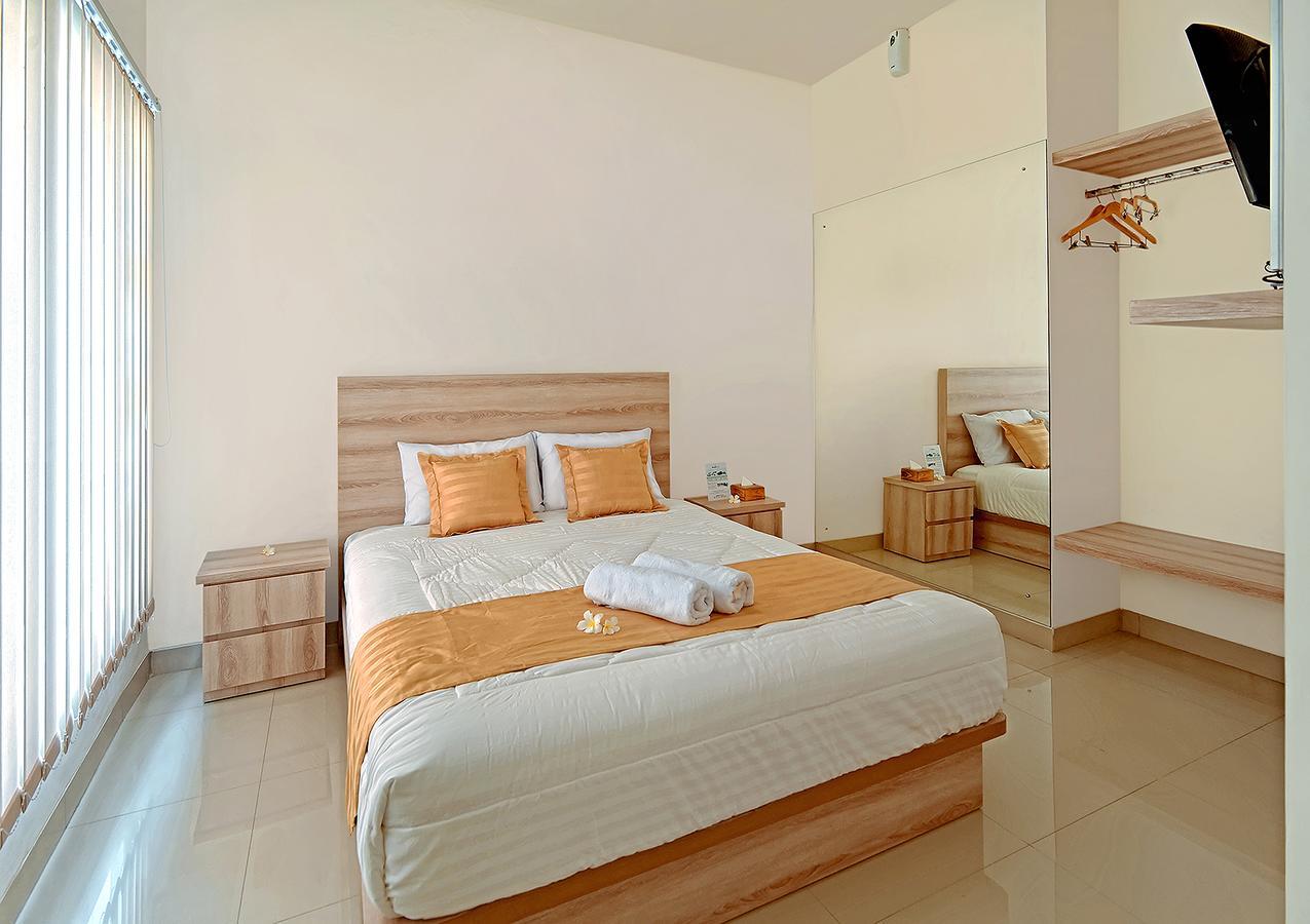 Wika Bali Beach House Jimbaran Værelse billede
